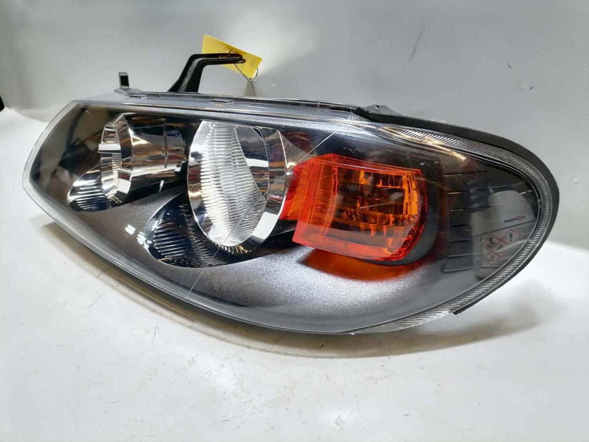 Nissan Almera N16 original Scheinwerfer vorn links Halogen Facelift Bj.2002